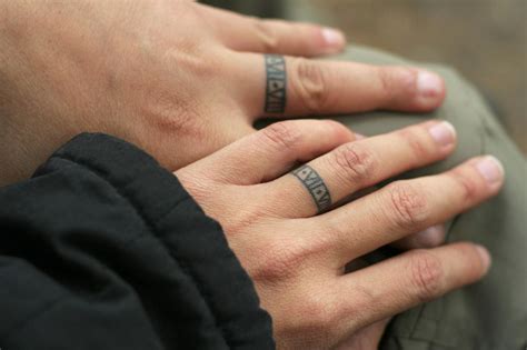 partner tattoos finger